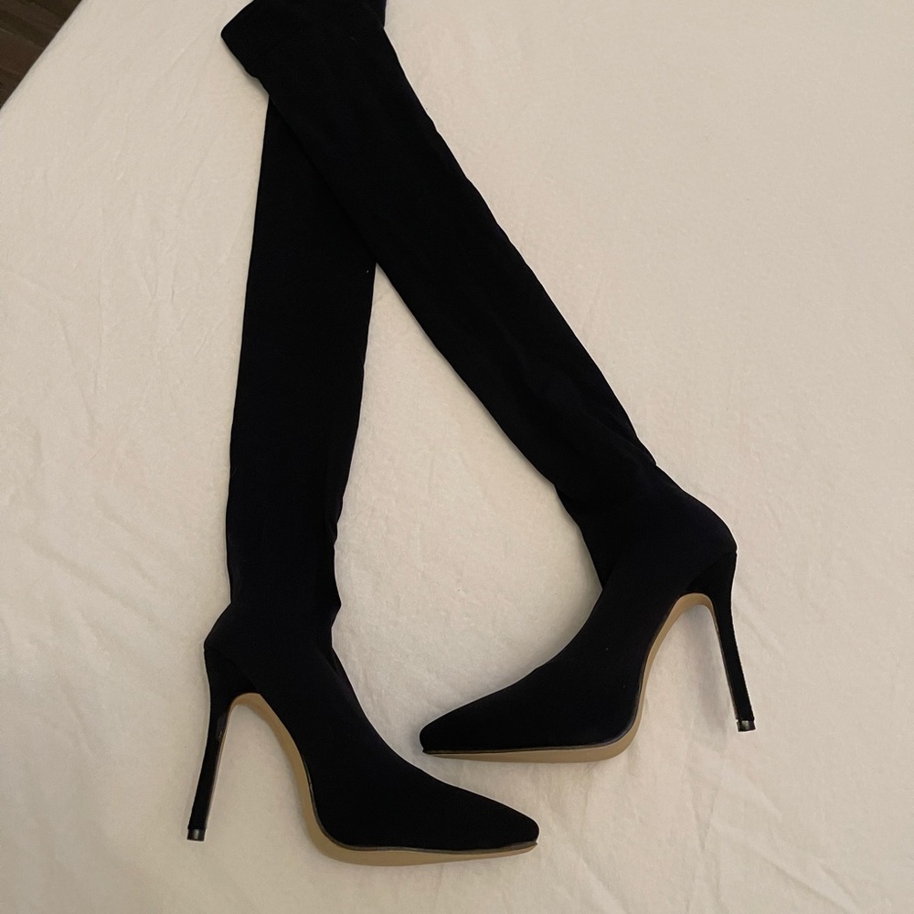 Black stiletto thigh highs
